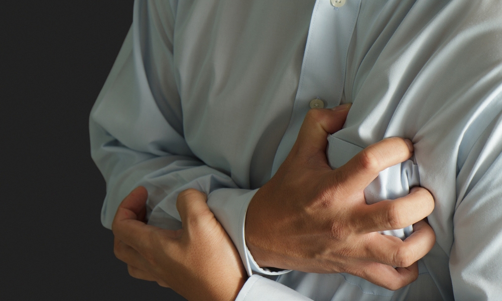 Heart attack warning signs including left chest pain arm pain shortness of breath and sweating